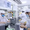 富寿省平川县工业园区Youngbag ViiNa公司电子元件生产线。图自越通社