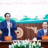 范明政在奠边省与省人民委员会举行工作会议 图自越通社