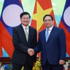 范明政总理会见老挝人民革命党中央总书记、国家主席通伦·西苏里 图自越通社