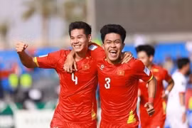 球员晓明为越南U23队攻入一球，将比分扩大至2-0。越通社发