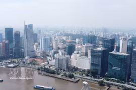 位于胡志明市越南国际金融中心涵盖西贡坊、滨城坊及安庆坊守添都市区。图自越通社