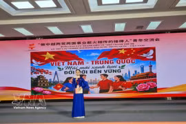 河内市富上坊团书记杜玉玲分享对两国友谊的感受。图自越通社