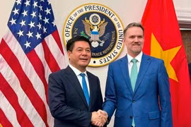 越南工贸部长阮鸿延与美国贸易代表贾米森·格里尔（Jamieson Greer）。图自越通社