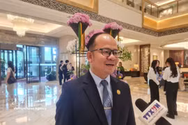 老挝人民革命党中央宣传部副部长、老挝宣传部副部长坎蒙·占塔吉接受越通社驻华记者采访。图自越通社