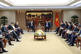 越南政府常务副总理范家足会见美国副国务卿克里斯托弗·兰道。图自baochinhphu.vn