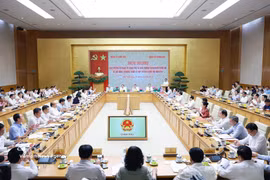 国会党委常委会与政府党委常委会关于第十六届国会第二次会议内容和议程的会议现场。图自越通社