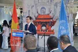 越南外交部副部长、越南UNESCO国家委员会主席吴黎文致开幕词。图自越通社