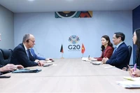 越南政府总理范明政会见德国总理弗里德里希·默茨。图自越通社