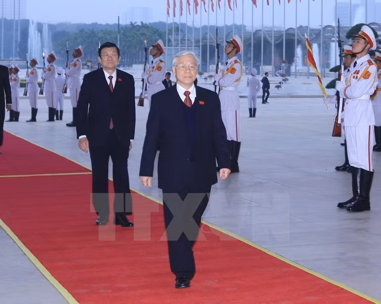  越共中央总书记阮富仲和国家主席张晋创出席会议。（图片来源：越通社）