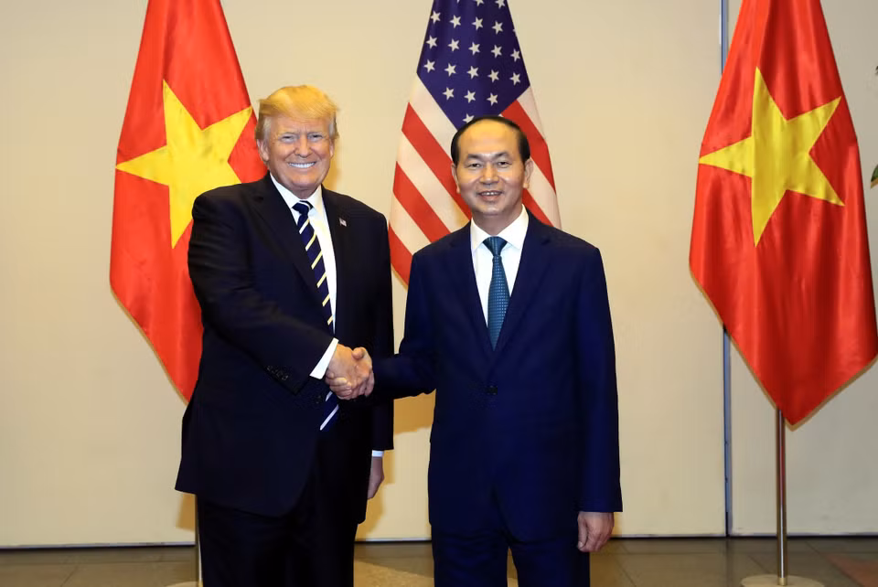 陈大光与特朗普。（图片来源：越通社）