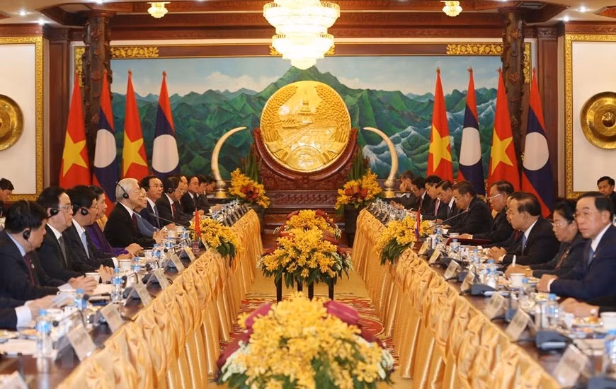 双方会谈场景。图自越通社