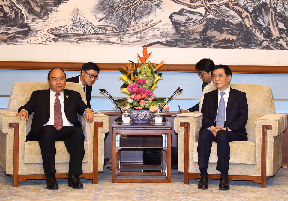 政府总理阮春福会见中共中央政治局常委、中央书记处书记王沪宁。越通社记者 统一 摄