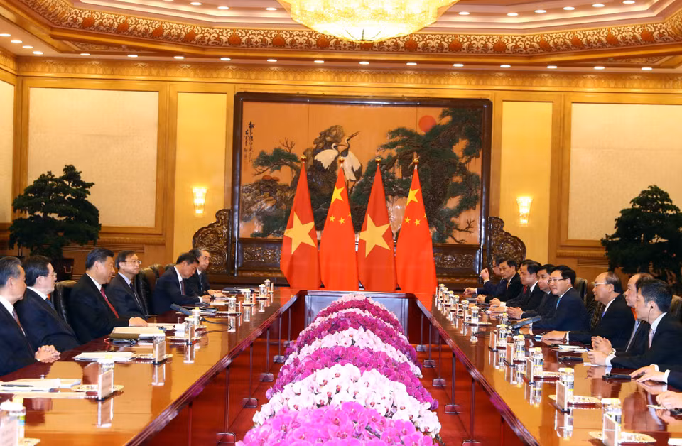 政府总理阮春福与中共中央总书记、国家主席习近平举行工作会议。越通社记者 统一 摄