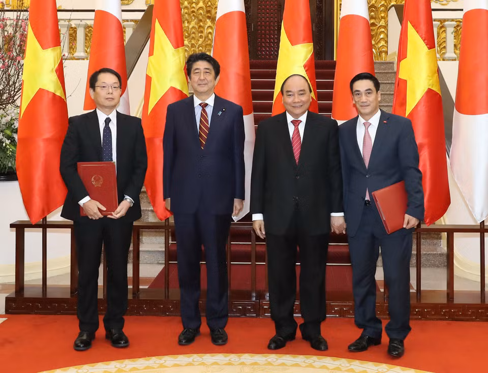 ​两国领导人见证《应对气候变化项目第7期ODA贷款协议》签署仪式（图片来源：越通社）​​