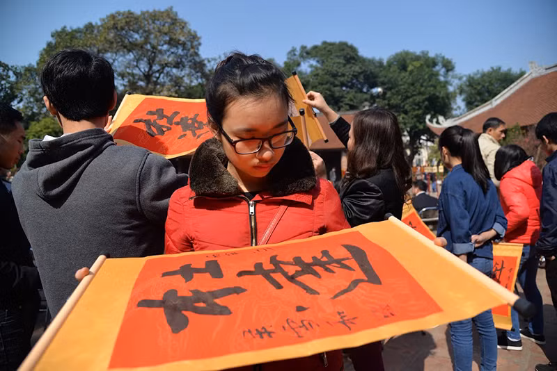 学生们希望在新的一年里取得更好的学习成绩。（图片来源：人民报网）
