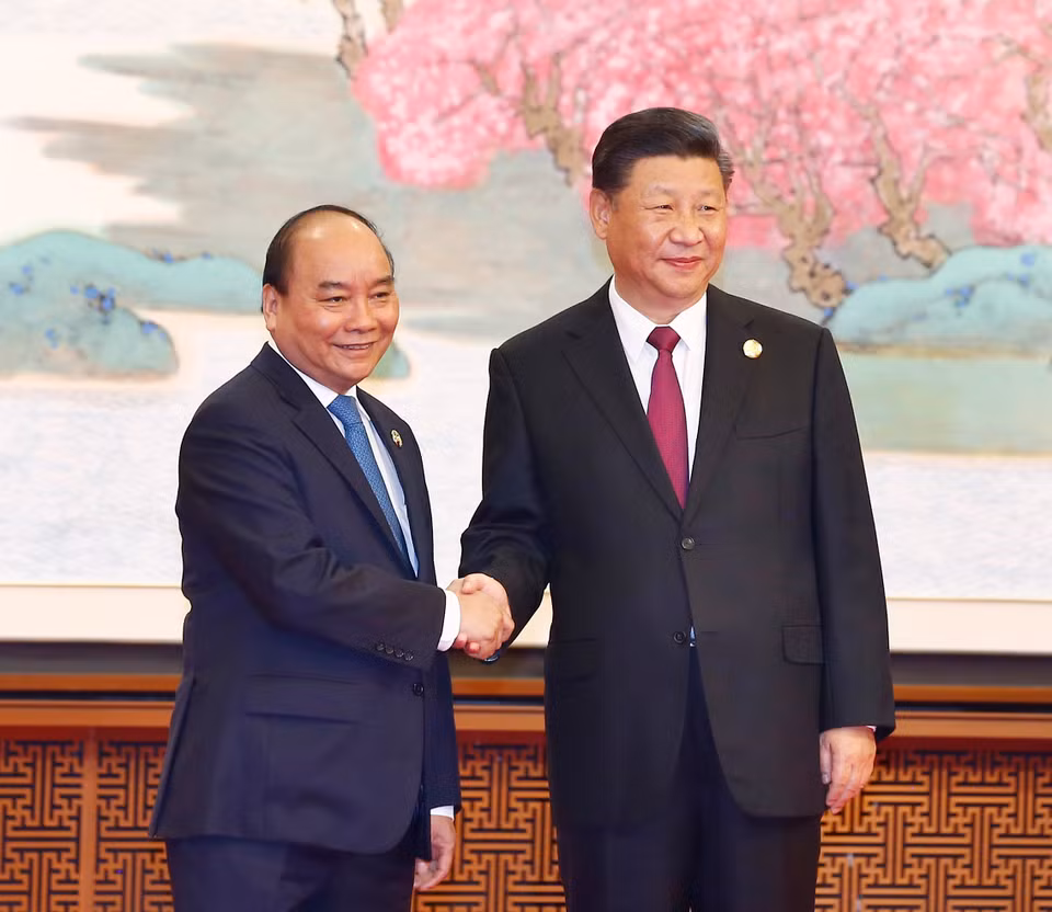 政府总理阮春福与中共中央总书记、国家主席习近平。越通社记者 统一 摄