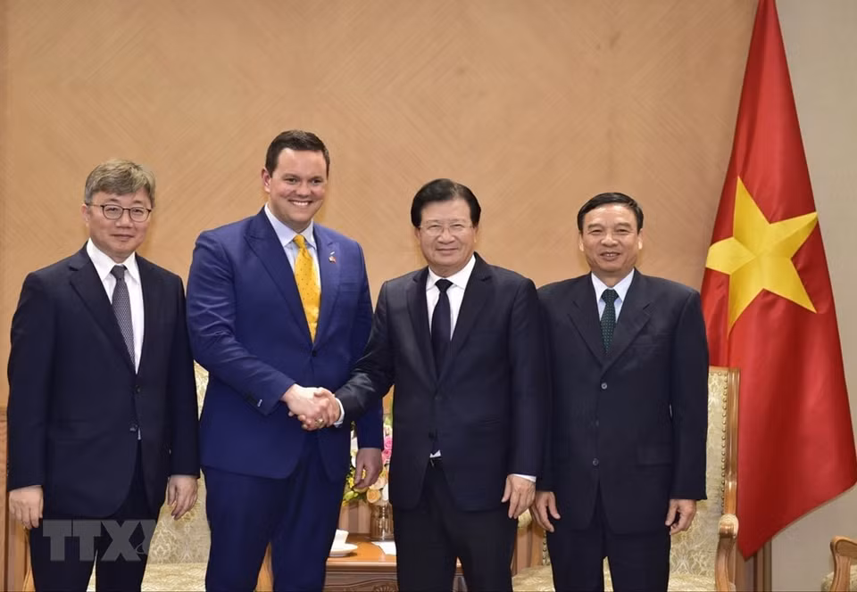 越南政府副总理郑廷勇于2月11日下午会见了关注越南液化天然气项目的美国和韩国投资者小组（ECV）。越通社记者 文叠 摄