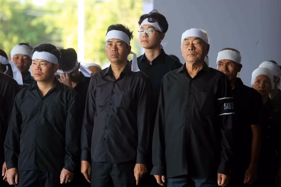 陈大光主席家属。图自越通社