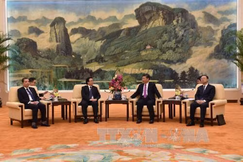 中共中央总书记、中国国家主席习近平在人民大会堂亲切会见了越共中央委员、中央对外部部长、越共中央总书记阮富仲的特使黄平君。