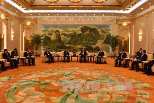 中共中央总书记、中国国家主席习近平在人民大会堂亲切会见了越共中央委员、中央对外部部长、越共中央总书记阮富仲的特使黄平君。