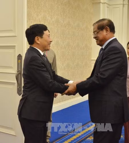 14日下午，越南政府副总理兼外长范平明已拜会了柬埔寨代理首相韶肯。（图片来源：越通社）