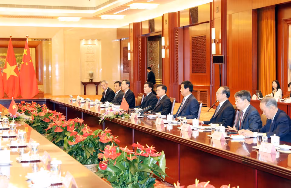 中国代表团在会谈上。越通社记者 仲德 摄