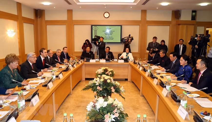 双边会晤全景。图自越通社