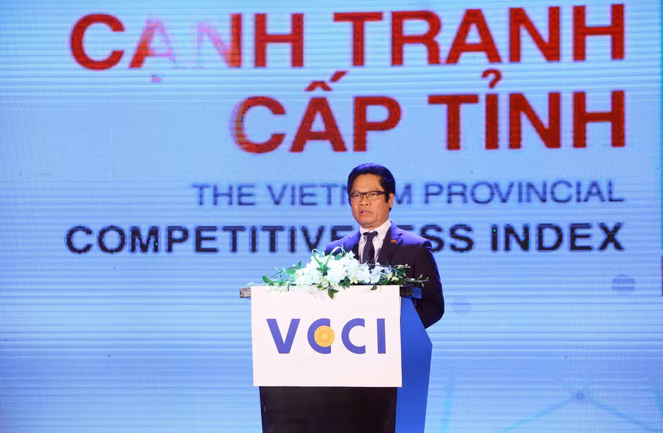 越南工商会主席武进禄发表讲话。越通社记者 光决 摄