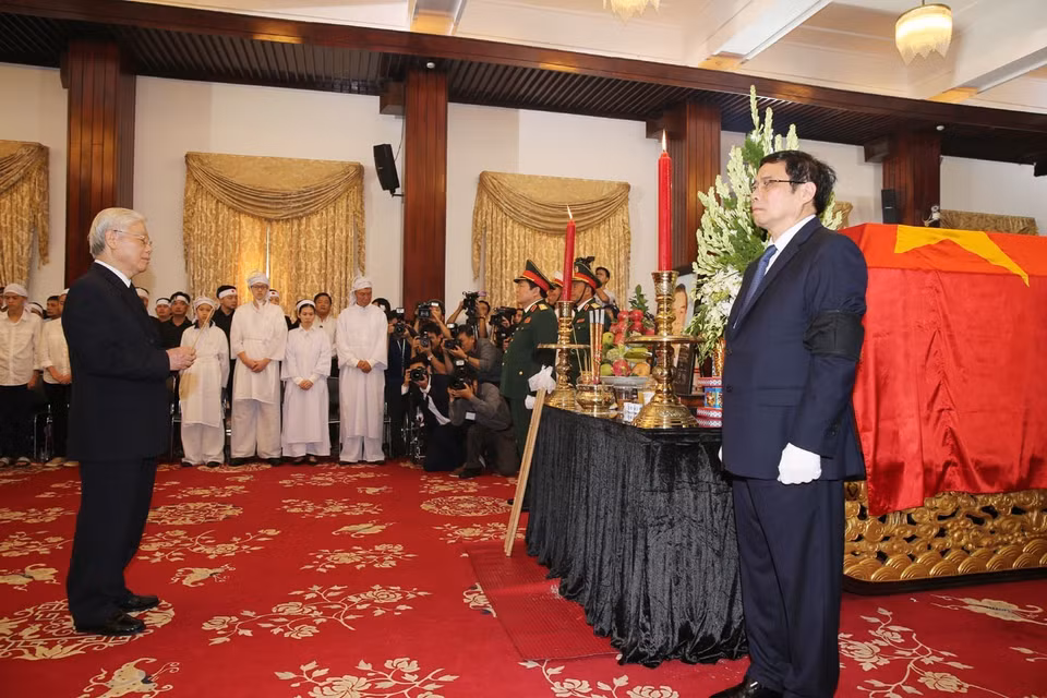 越南原政府总理潘文凯吊唁仪式3月20日在胡志明市统一会场举行。（图片来源：越通社）