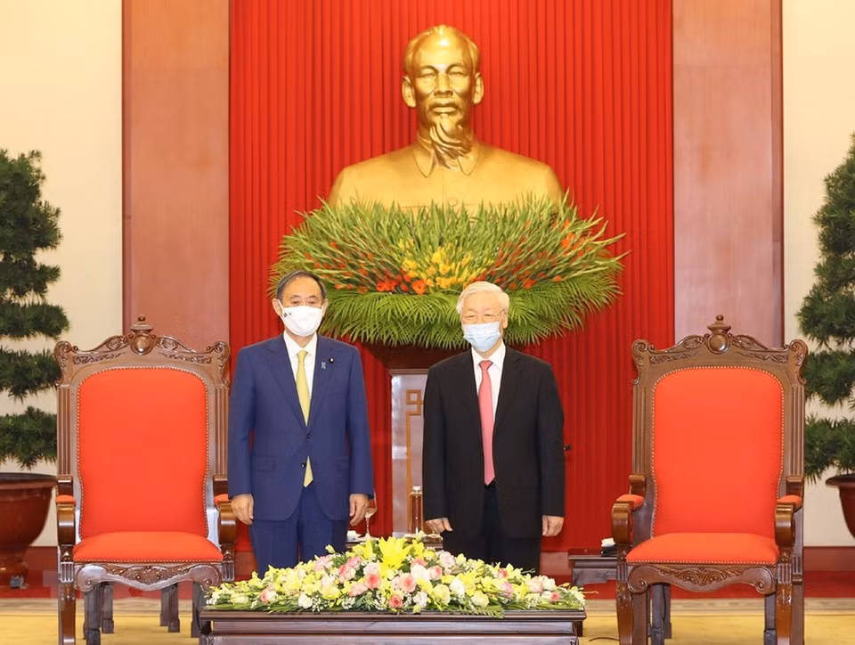 越共中央总书记、国家主席阮富仲会见日本首相菅义伟。越通社记者智勇摄