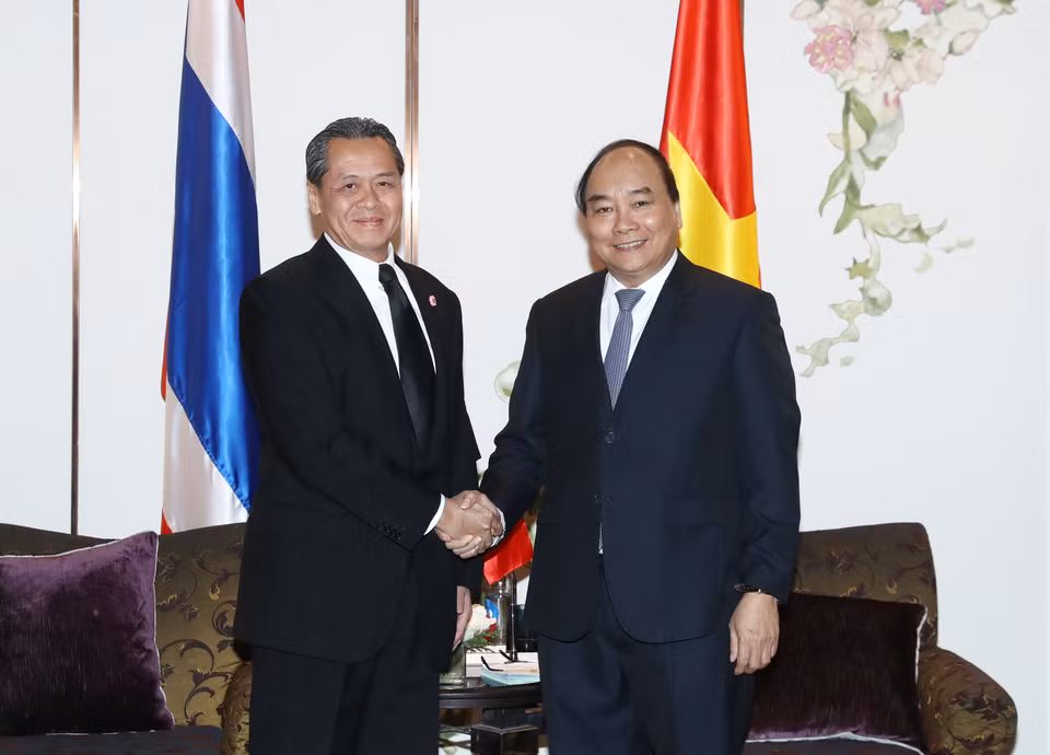 阮春福会见泰华农民银行（Kasikorn Bank）董事长兼首席执行官伍万通。（图片来源：越通社）