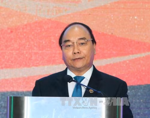 阮春福在宴会上致辞（图片来源：越通社）