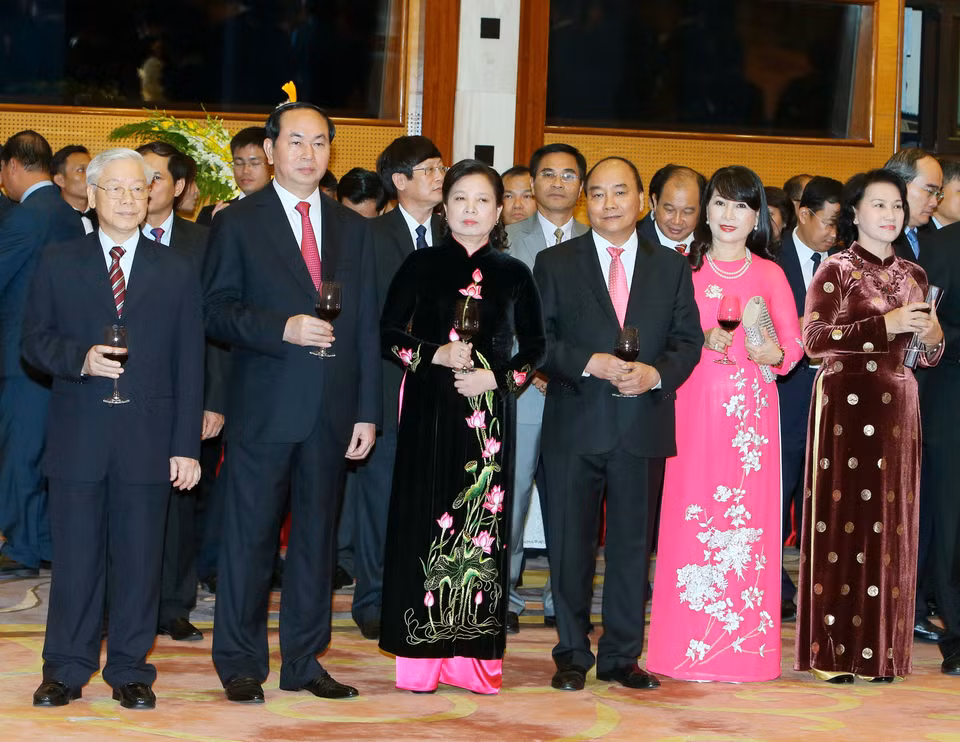 越南党和国家领导人出席招待会。