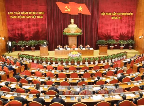  越共第十一届中央委员会第十四次全体会议在河内隆重开幕。（图片来源：越通社）