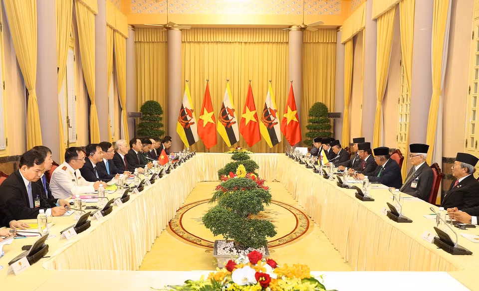 双方进行会谈。图自越通社