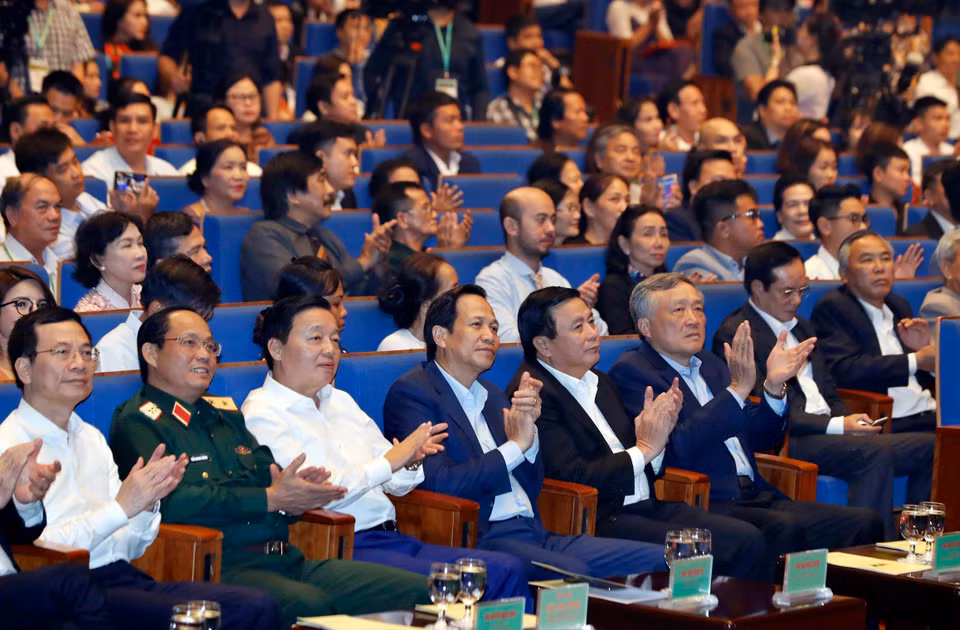 出席活动的与会代表。图自越通社