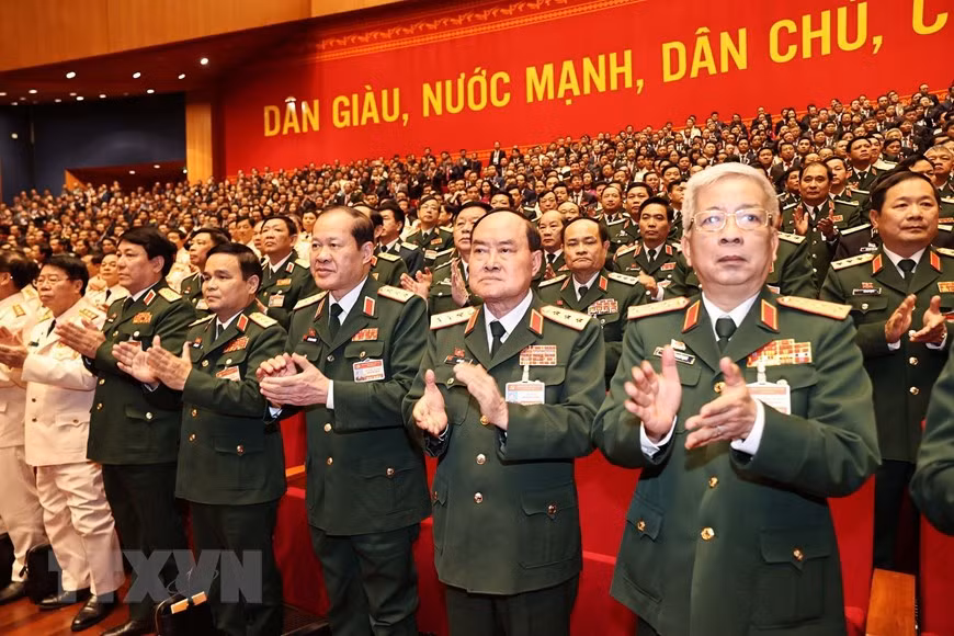 出席越南共产党第十三次全国代表大会筹备会的军队党委代表团。图自越通社