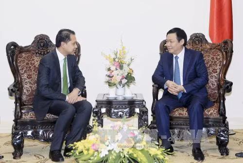 越南政府副总理王廷惠会见泰国泰华农民银行行长Teeranun Srihoong（图片来源：越通社）