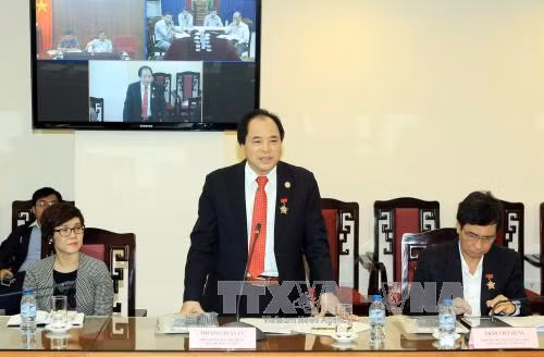 西北地区事务指导委员会副主任张春居在会上发表讲话。（图片来源：越通社）