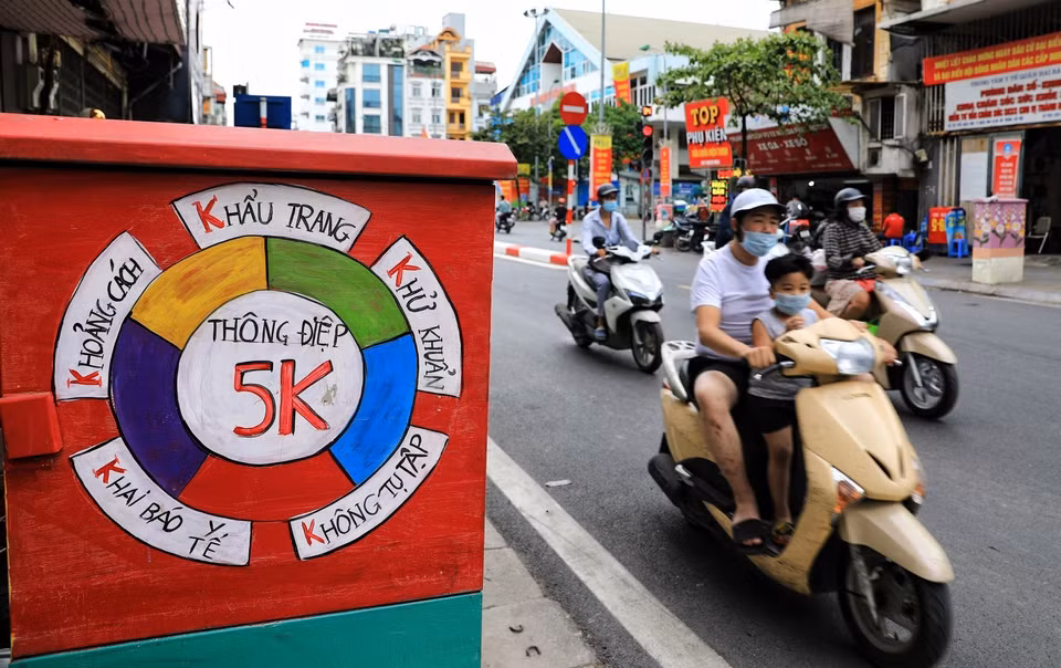 向首都居民宣传5K 原则，即“口罩、消毒 、保持距离 、不聚众、健康申报” 。图自越通社
