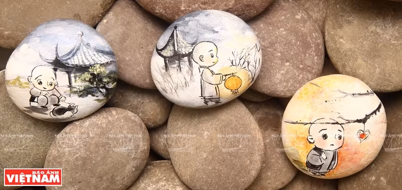 阮忠坚的石头画。图自 越通社