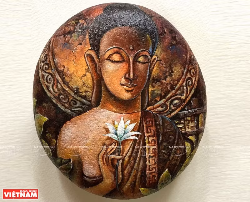 阮忠坚的石头画。图自 越通社