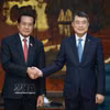政府总理黎明兴会见老挝中央检查委员会主任、国家监察总署署长万赛。图自越通社