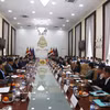 对话现场。图自越通社