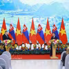 越南政府总理黎明兴与斯洛伐克总理罗伯特·菲佐共同会见两国记者。图自越通社