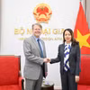 越南外交部副部长阮明姮在外交部驻地会见了美国商会（USCC）副主席约翰·戈耶。图自外交部