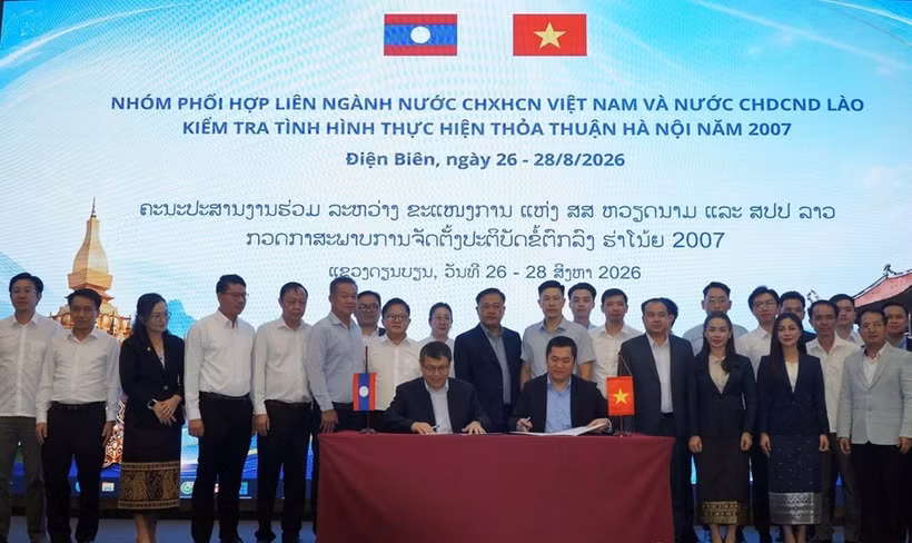 越老两国跨部门协调组代表签署工作会议纪要。图自工贸部