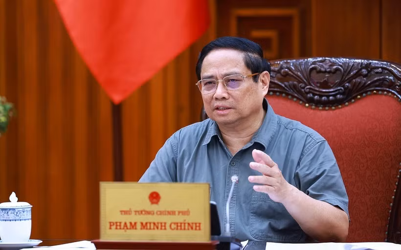 政府总理范明政主持召开政府常务委员会与经济-社会组常务委员会会议。图自越通社