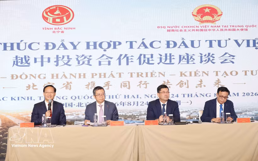 北宁省和越南驻华大使馆代表在座谈会上发表讲话。图自越通社