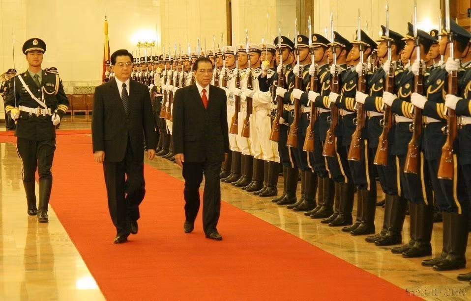2008年5月，越共中央总书记农德孟访问中国期间，双方决定将越中“全面合作”关系升格为“全面合作伙伴”关系，为两国关系注入强大动力。图自 越通社